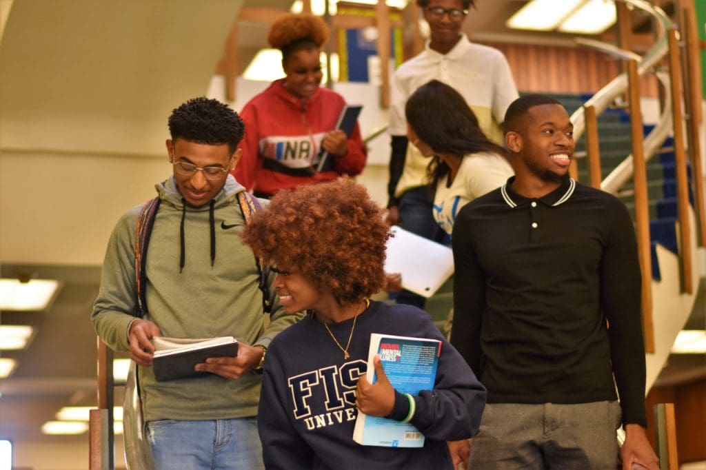 Students walking down stairs